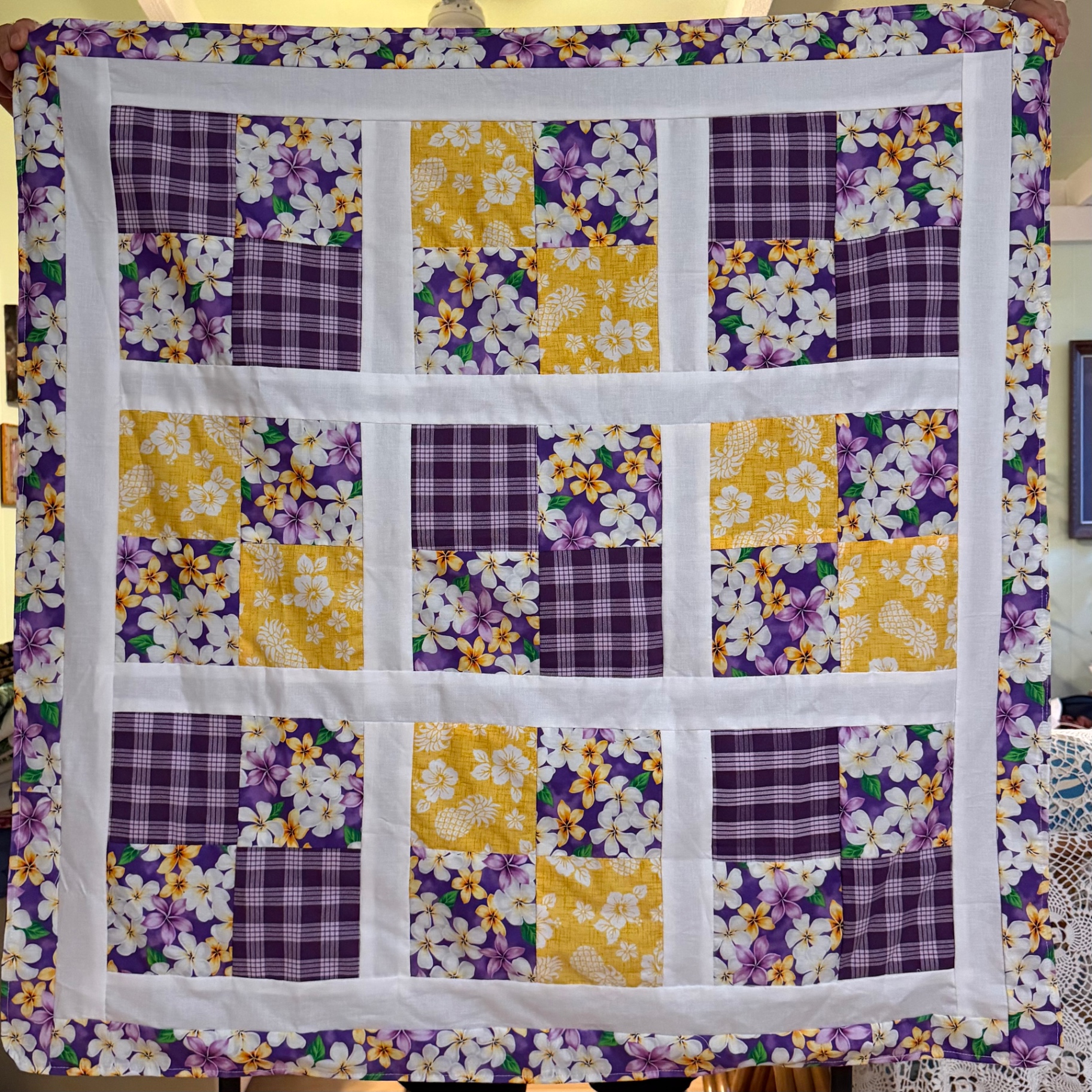 Purple, yellow, and white plaid Kīhei Pili summer blanket